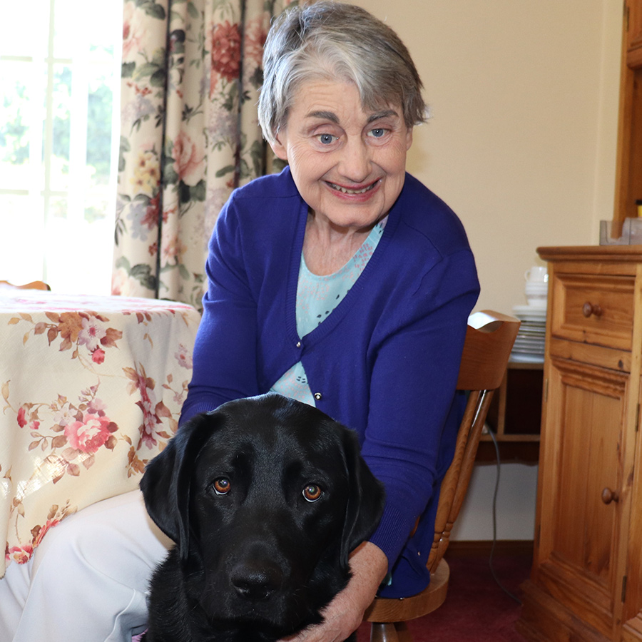 A lady with her Guide Dog