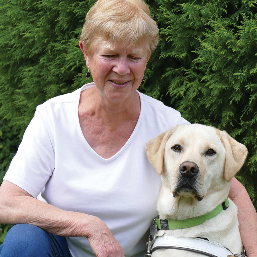 a lady with her guide dog