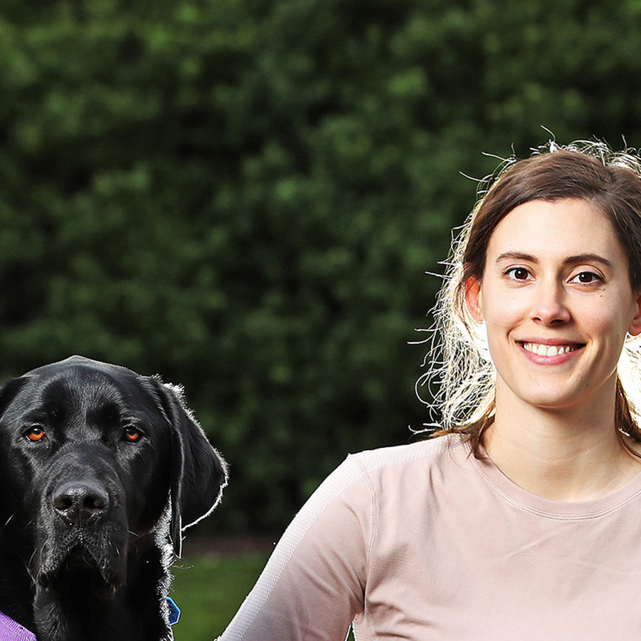 A happy lady with a dog