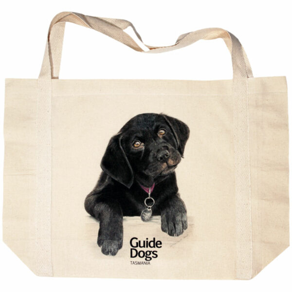 Tote bag with an illustration of a black puppy