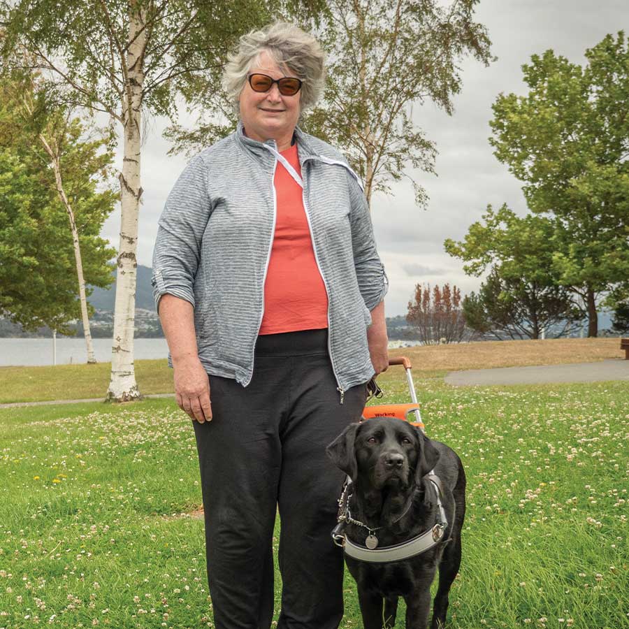 Guide dog handler and a guide dog