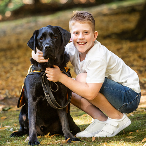 a child with a dog