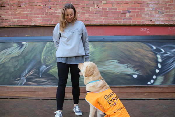 person with a Guide Dog in training